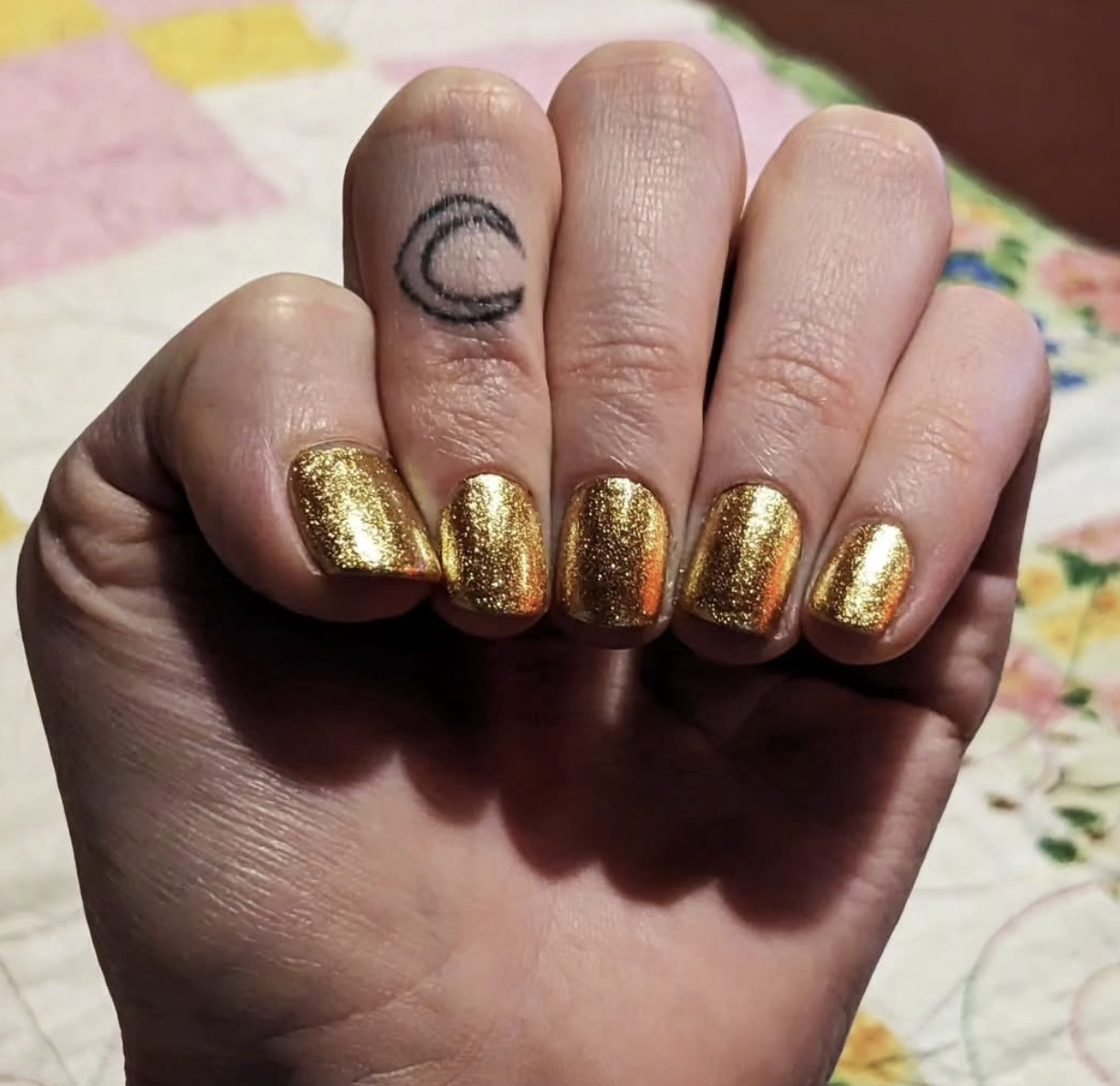 Gold foil nail polish